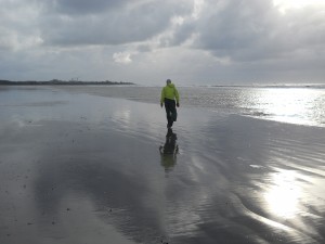 Man on stormy beach