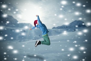boy jumping in the snow