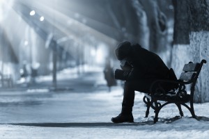 Depressed woman on a bench