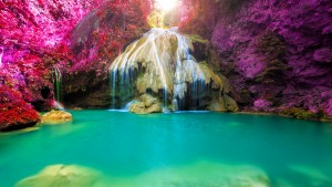 wonderful waterfall with colorful tree in thailand